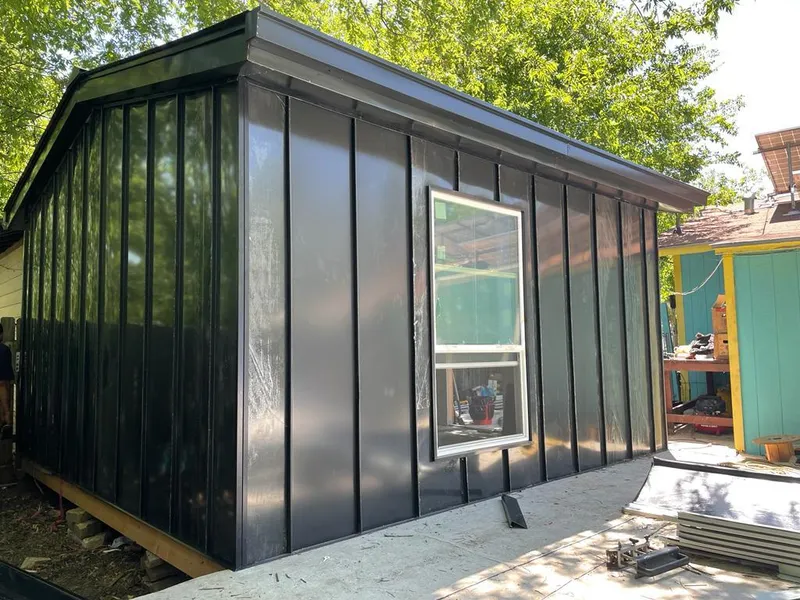 Black standing seam metal wall panels for Metal Roof Installation in Stonegate