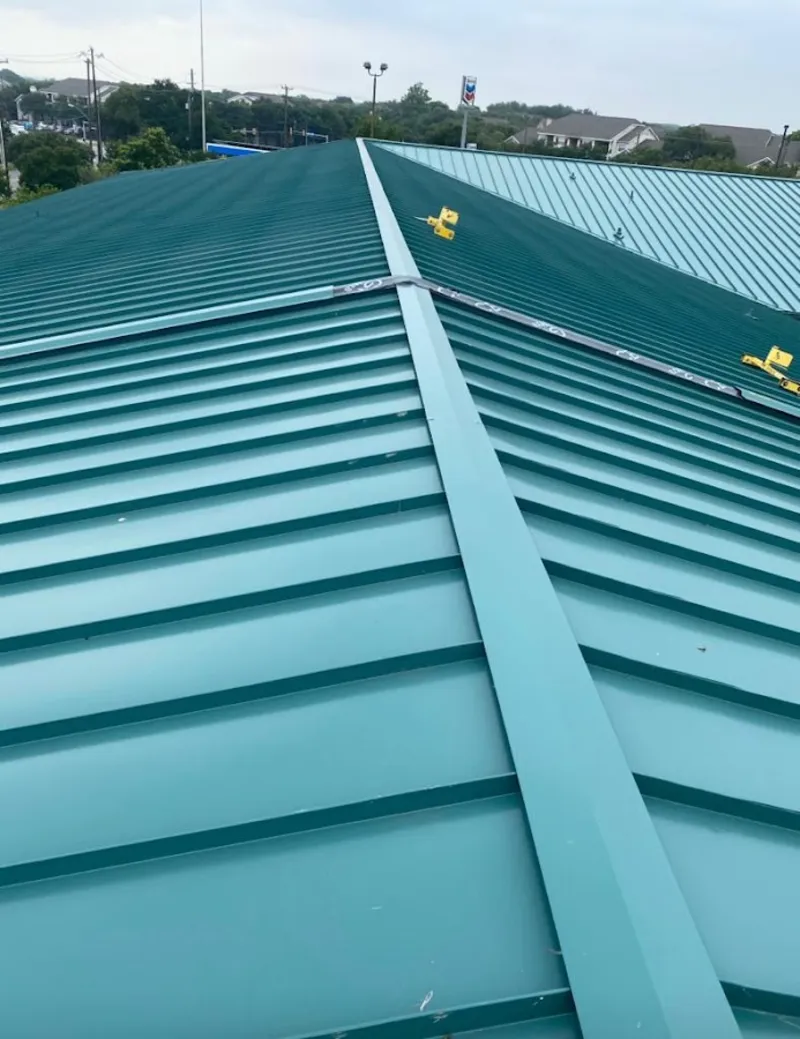 Green commercial metal roof ridge and valley for Metal Roof Repair in Stonegate